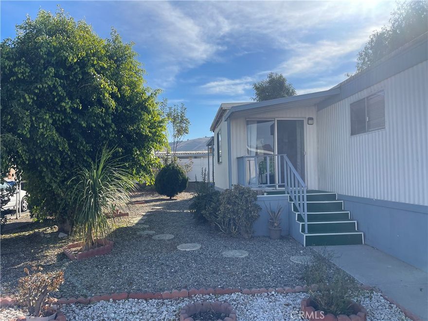 Located in a desirable 55+ senior park, this move-in-ready home features 2 bedrooms and 2 bathrooms, spacious yards, and ample parking. Conveniently situated near freeways and shopping centers, it offers both comfort and accessibility.