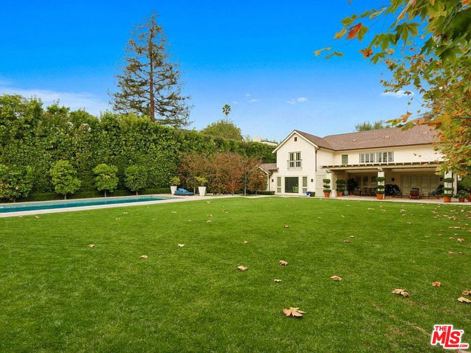 Prime Tennis Court Estate on huge 36k sq ft lot, on prestigious Alpine Drive. Extremely private, and gated and this Traditional Estate. features 5 Bedrooms up, including master with separate his and hers closets and baths. 4 additional en-suite bedrooms. Great entertaining spaces include: Grand living room, family room, and dining for 20+. Spacious newer eat-in kitchen overlooking park-like backyard with massive grassy yard, 70 foot pool, gorgeous guest house and lighted championship Tennis Court.