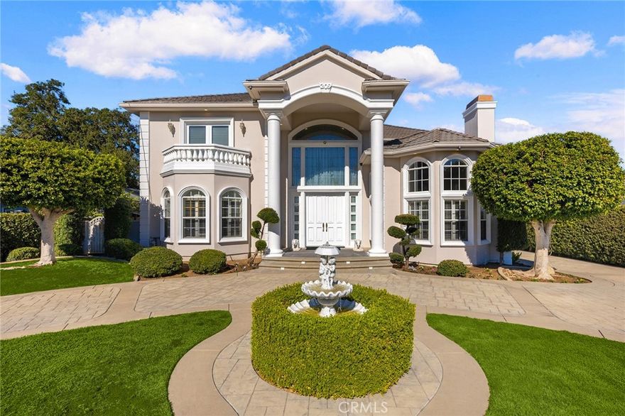 Located in one of Arcadia’s most prestigious neighborhoods, this custom designed estate home faces South and boasts Baldwin Stocker Schools with convenient access to supermarkets, shopping, restaurants , USC Arcadia Hospital, Santa Anita Mall, Park and Golf Course and easy access to Fwy. 210.
This 4-Bedroom, 5 1/2-bath offers 4,698 S.F. of living and entertainment space on a flat 16,342 S.F. lot. Features include. Central air/heat, security and intercom system, custom wood paneling with crown molding, central vacuum and custom sculpted carpet. There are 2 balconies and 3 fireplaces and walk-in closets in all bedrooms. A double-gated circular driveway leads to a detached 3-car garage with RV parking. One garage has been legally converted into a storage room (with permits) and can easily be converted back to garage. A marble front entrance leads into an elegant foyer with expansive high ceilings that showcase a formal living room and dining room and the private library boasts a bright atmosphere and features custom built-in cabinets and bookshelves. The spacious gourmet kitchen is fitted with granite countertops, a large central island complete with Wolf and Sub-Zero appliances. Family room features dramatic high ceilings and a custom wet bar that overlooks a professionally landscaped backyard with a sparkling pool, spa and pool house. One bedroom suite located downstairs is ideal for in-laws or guests. Upstairs there are 3 bedroom suites available all with 1 or more walk-in closets. The master suite boasts a luxurious master bath with steam shower and jacuzzi tub.