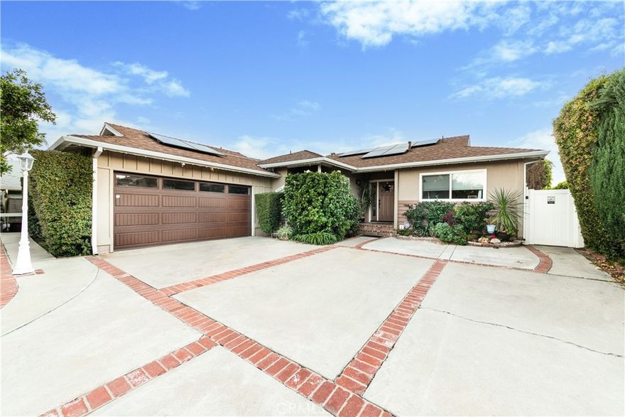 Tucked into a highly desirable and central location, this inviting residence offers both comfort and convenience, with easy access to the 118 and 405 freeways and just minutes from Knollwood Country Club, Porter Valley Country Club, and the Vineyards upscale shopping and entertainment at Porter Ranch. 
From the moment you step inside, the home reveals a thoughtfully updated interior that blends timeless charm with modern finishes. Engineered wood flooring flow throughout, complemented by smooth ceilings, recessed lighting, and ceiling fans in every room for year-round comfort. Elegant crown molding, detailed baseboards, and classic wainscoting in the dining room add architectural character, while contemporary touches create a polished, move-in-ready feel.  This property also produces power through the fully paid off solar panels.  There is also an electric car charger for the eco-friendly buyer.
The heart of the home is the open-concept family and dining areas - perfectly designed for entertaining, family gatherings, or simply staying connected while meals are prepared. The kitchen is both stylish and functional, featuring upgraded cabinetry with brushed nickel hardware, breakfast bar, a stainless-steel sink, tiled walls, and a bonus stainless steel appliance package that includes a side-by-side refrigerator, dishwasher, stove, and vent hood. Move-in ready from day one.
Additional upgrades enhance both comfort and efficiency, including central air and heat, dual-pane windows throughout, plantation shutters, upgraded bathroom countertops, and a cozy fireplace that anchors the dining space with warmth and ambiance.
Step outside to a private backyard retreat where mature fruit trees frame a welcoming outdoor living space. A covered patio, family-sized gazebo, and  fire pit create the perfect setting for relaxing evenings or hosting memorable gatherings with friends and family.
With its blend of charm, modern upgrades, and an unbeatable location, this home delivers exceptional value and lifestyle appeal - just in time for the holidays. Homes like this don’t stay on the market long. Schedule your private showing today and experience it for yourself.
