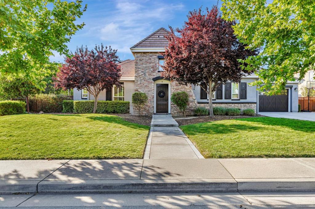 Welcome to this stunning home in the Amadora community in sought after Morgan Hill. This home boasts an expansive 4,059 square feet of living space, nestled on a generous 21,562 square foot lot. Elegantly designed, it offers a harmonious blend of luxury and comfort. Upon entering, you are greeted by a bright, open-concept layout. This home features five spacious bedrooms, providing ample accommodation for family and guests alike. The chef's kitchen is a culinary masterpiece, equipped with high-end, stainless-steel appliances, quartz countertops, an expansive island and breakfast nook, sure to inspire gourmet cooking and allowing for effortless entertaining. The property includes four well-appointed bathrooms, designed with modern elegance and high-end finishes. The master bathroom features Italian marble, double sinks, and separate powder room. A dedicated teen room offers a versatile space for entertainment or study. Embrace true outdoor living in a private courtyard, complete with a cozy fireplace, perfect for intimate gatherings. The expansive backyard offers plenty of room for outdoor activities and relaxation. This home is equipped with a 2kw owned solar system as well. A testament to refined living, this home awaits those seeking a residence of distinction and luxury.
