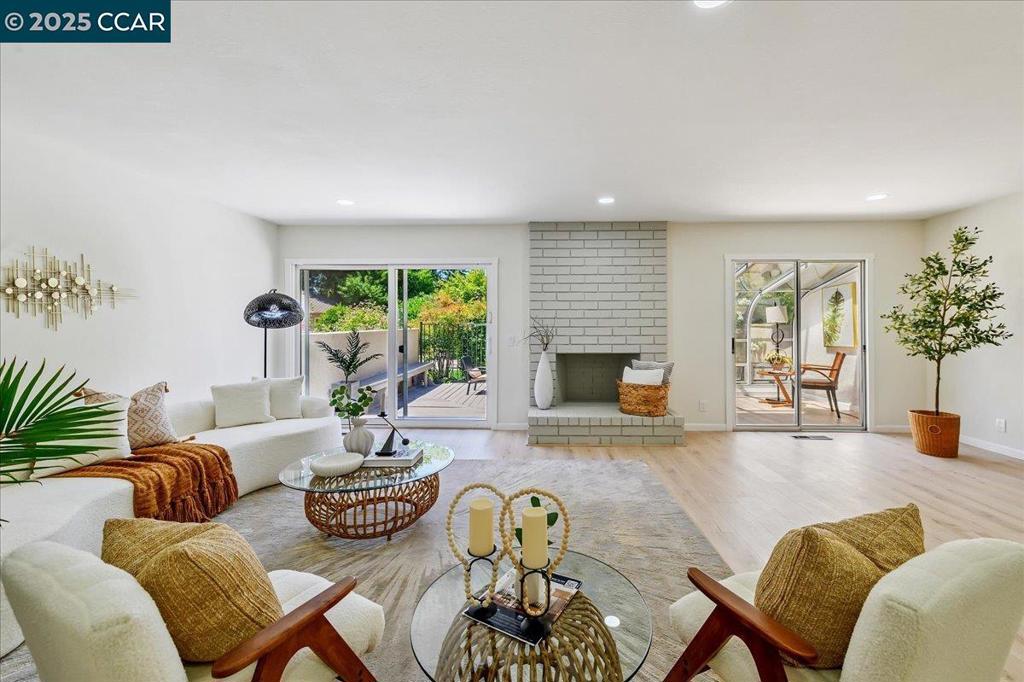 OPEN SAT 8/23 FROM 1PM-4PM! Discover modern living in this beautifully remodeled townhouse! Thoughtfully updated throughout, this home combines stylish design with everyday comfort. Inside, fresh paint and brand-new flooring set the stage for the open-concept layout, where the living and dining areas flow seamlessly together. The fully renovated kitchen features sleek cabinets, contemporary countertops with coordinating backsplash, and new stainless steel appliances. All bathrooms have been refreshed with chic vanities, modern fixtures, and designer tile details. Bedroom and bath on the main level offers privacy for visiting guests or multi-generational living. Enjoy a private outdoor patio and a bright sunroom—entertaining or simply unwinding. From the patio, step directly to one of the community pools and embrace resort-style living right at home. Additional features include an attached garage and ample guest parking. Residents of this peaceful neighborhood also have access to swimming pools, tennis courts, a clubhouse, and lush greenbelts—offering the perfect balance of comfort, recreation, and community. Close to top-rated schools, freeway access, and just a short drive to downtown Danville!