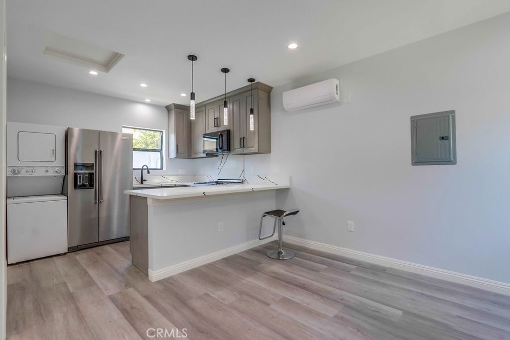 Photo of 1260 E Turin Avenue #B, Anaheim, CA 92805 (MLS # OC26095002)