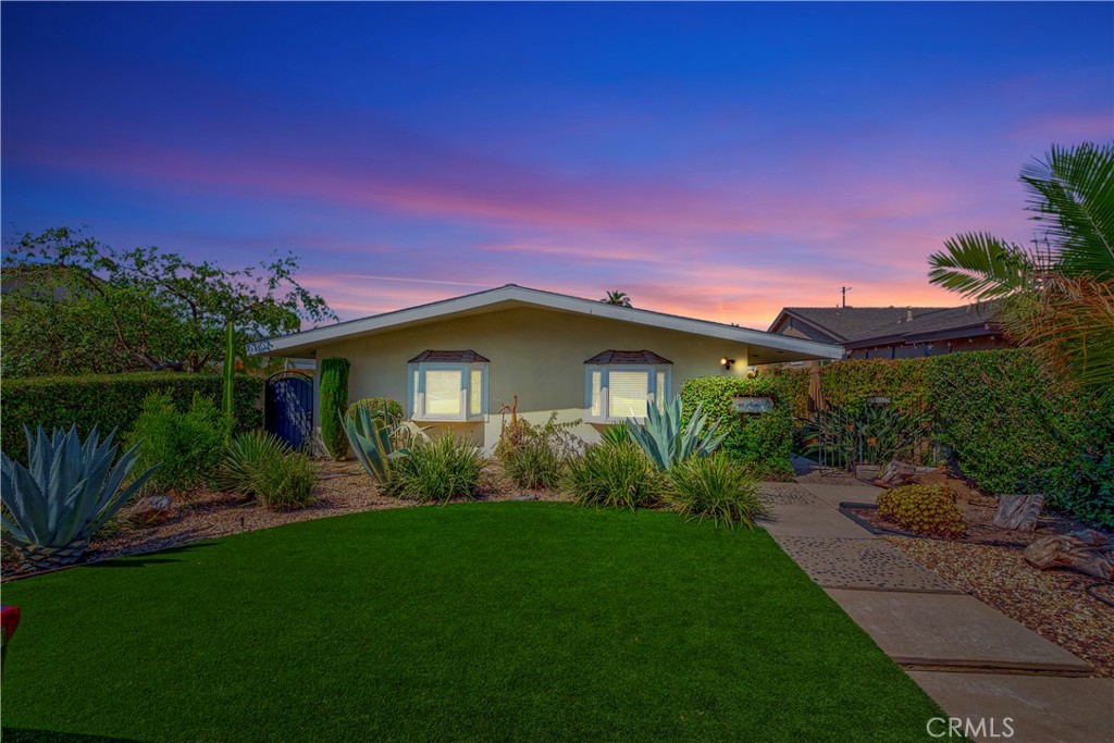 Step into your Mid-century modern architectural delight. Immaculately maintained by the second owner, this energy efficient GE Gold Medallion all-electric solar home is located in the Wrigley neighborhood of Long Beach, in the hidden haven known as Memorial Heights. 3211 Locust is situated on a very large interior lot with endless possibilities, from an incredible homestead with garages and parking galore, to a home or rental hosting a completely separate home-based business with enclosed secured parking for all vehicles… or just imagine an incredible ADU or 2. This home is a true single level home with a gracious indoor-outdoor seamless flow and full of natural light, both turnkey beautiful and upgraded thruout with dual-pane doors and windows, central HVAC, solar system, new roof 2024, and so much more. The layout is optimal where the great room and separate family room walk out thru walls of glass to lush landscaped grounds with the ultimate privacy. The family room offers a classic firehood and is comfortably open to the vintage mid-century eat-in kitchen with breakfast peninsula and built-in desk, and the bedroom corridor presents quiet privacy for 2 large guest bedrooms and a grand primary bedroom with bathroom en-suite, guest bathroom with laundry facilities and storage galore. Then, for the pride-of-owner that enjoys all the toys, this home boasts a large attached garage, a detached 3-bay garage with like 10’ ceilings plus parking for 6 or more big-boy toys, be it cars, RV, water crafts, vans, trucks, etc., you choose. Don’t miss the opportunity, it’s an incredible value for the discerning buyer that wants it all, ….home, business or the potential ADU for 2.