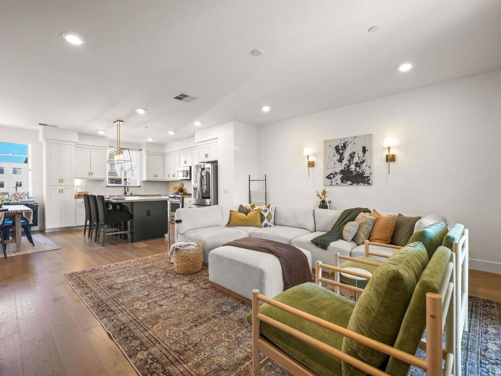 Welcome to 29361 Hub Ct, a 3-bedroom, 2.5-bathroom, tri-level townhome in the highly desirable SoHay Community of Hayward. Offering 1,684 sqft of modern living space, this residence features a bright, open-concept floor plan with designer upgrades throughout. The main level boasts spacious living & dining areas seamlessly connected to a contemporary kitchen with sleek finishes perfect for entertaining.Step outside to your private patio, ideal for morning coffee or evening relaxation. Upstairs, the generous primary suite includes a spa-like en-suite bath and an oversized closet. Central AC & forced-air heating, energy-efficient solar panels, a convenient upstairs laundry area, and an attached 2-car garage with ample storage. The SoHay Community provides beautifully landscaped courtyards, nearby walking paths, and the newly built SoHay Park with playgrounds, picnic areas, and basketball courts. Conveniently located just one street from BART & with quick access to major freeways, this home offers easy commuting to both Silicon Valley & San Francisco. HOA dues are $358/month & cover exterior & roof maintenance, owned solar panels also maintained by the HOA (significantly reducing utility bills), common area maintenance, landscaping, & insurance.