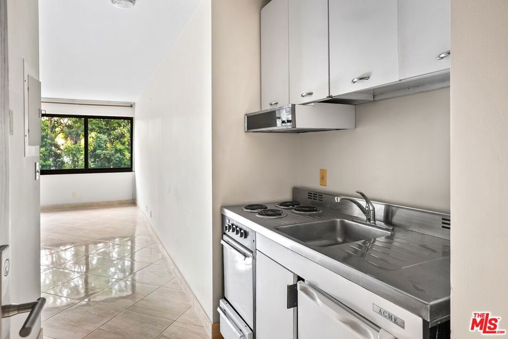 Photo of 10560 Wilshire Boulevard #205, Los Angeles, CA 90024 (MLS # 25618807)