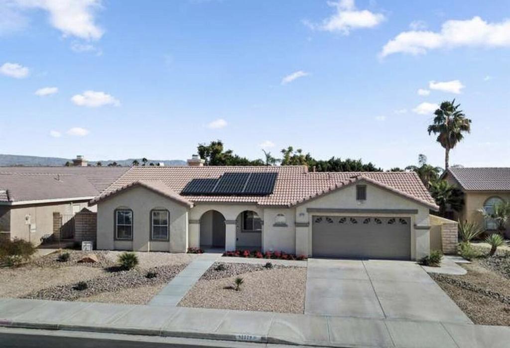 Discover modern desert living in this beautifully upgraded Palm Desert home. With a renovated yard, updated interiors, and energy-efficient features, this property combines style, comfort, and convenience in one of the most desirable locations in the Coachella Valley.Property Highlights: Upgraded Living Newly remodeled master shower, brand new AC and water heater, and solar panels for year-round efficiency and lower utility bills. Spacious Outdoor Retreat Large renovated backyard, ideal for entertaining, relaxing, or enjoying warm desert evenings. Prime Location Just minutes from world-class golf courses, El Paseo shopping district, fine dining, schools, and local parks. Easy access to major transit routes makes commuting and travel effortless. Modern Comforts Bright, open living spaces designed for today's lifestyle.Lease Terms and Utilities:1.Rent Payment: The first month's rent is due at the time of lease signing.2.Utilities: Tenant is responsible for payment of all gas and water utility charges directly to the respective utility providers.3.Solar Energy: The Premises includes a solar energy system, the cost of which is included in the rent. Any solar energy consumption exceeding the leased amount will be billed to Tenant annually.4.Smoking Policy: No smoking is permitted anywhere on the Premises, including indoor and outdoor areas.5.Occupancy Limit: Maximum occupancy of the Premises is five (5) persons.