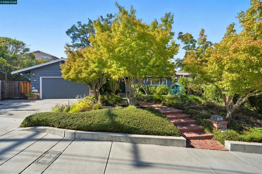 Located in one of Orinda’s most desirable neighborhoods, this spacious home offers a flexible floor plan, an oversized family room, and a flat backyard designed for everyday living and entertaining. The updated kitchen features a built in breakfast nook and chef’s appliances, opening to generous spaces that make daily life seamless. Light filled living and dining rooms create a welcoming setting for holidays, dinners with friends, and quiet evenings. Upstairs, the primary suite offers a peaceful retreat, while two additional bedrooms share a Jack and Jill bath. Two more bedrooms on the lower level provide flexible options for guests, a home office, or a playroom. The backyard is ideal for barbecues, gardening, and relaxing under twinkling lights, with ample space for both quiet mornings and lively evenings. Within walking distance to twelve years of schools and surrounded by a friendly community where neighbors wave on their evening walks, this home blends comfort, space, and convenience. Welcome to the Butterfly House.