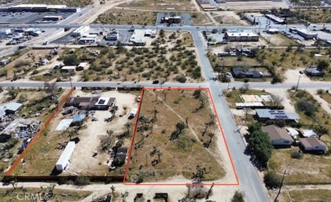 Photo of 7199 Grand Ave, Yucca Valley, CA 92284 (MLS # IV26050355)