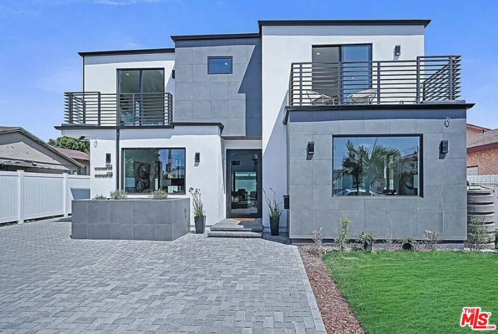 Welcome to 4712 Berryman Ave, a striking modern compound located on a quiet street in the heart of Culver City. This rare offering includes two beautifully crafted homes on a single lot: a 4-bedroom, 4.5-bathroom main residence and a detached 3-bedroom, 2-bathroom back housean ideal setup for extended family, guests, or rental income.Step inside the main house and experience the epitome of California modern living. The open-concept layout features a sun-drenched living room with oversized windows, custom lighting, and a dramatic floating staircase that anchors the space with bold architectural flair. The kitchen is a chef's dream, complete with a massive island, sleek cabinetry, and top-tier appliances, flowing effortlessly into the dining and entertaining areas.Upstairs, the serene primary suite boasts a private balcony, walk-in closet, and spa-inspired bathroom. Every bedroom has been thoughtfully designed with comfort and privacy in mind, and each bathroom features high-end finishes and designer touches throughout.The back house is equally impressive, offering three spacious bedrooms, two full bathrooms, a full kitchen, and its own private outdoor spaceperfect for guests, in-laws, or as a highly desirable income-producing rental.Located just minutes from the vibrant energy of Culver City, this home places you within easy reach of top-rated schools, parks, Whole Foods, Playa Vista, and LA's booming tech and entertainment hubs. Commuting is a breeze with convenient access to the 405 and 10 freeways, and the nearby Ballona Creek bike path leads straight to the beach.Please do not disturb tenants. Showings are available by appointment onlycontact us today to schedule your private tour.