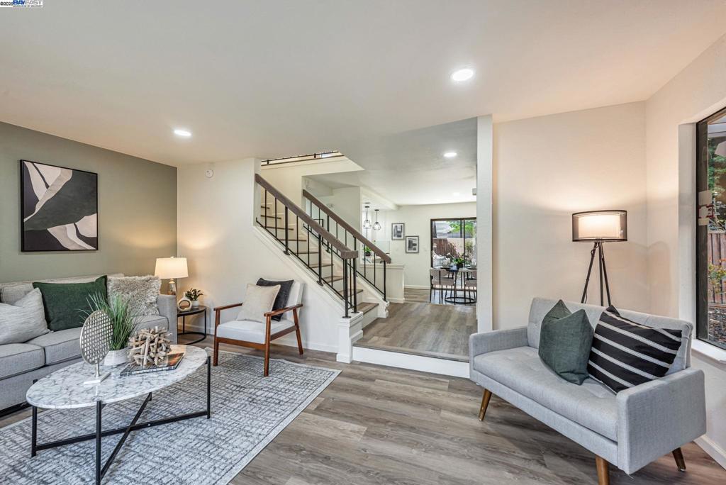 Step into luxury and move-in ready perfection in desirable Fremont! This stylishly renovated, single-family–style end-unit townhome offers an exceptional blend of comfort, design, and convenience. Own in the "Happiest Place to Live" per Kiplinger! This tastefully renovated, spacious home has 3BRs, 2.5BAs, 2-car garage, outdoor patio and a separate secluded backyard, is a tremendous value in today's market. The gourmet kitchen is equipped with quartz counters & waterfall edge, custom maple cabinetry, and energy-efficient appliances, providing elegance, durability, and sustainability. The uniquely designed spa-inspired bathrooms feature high-end fixtures and finishes, designed for relaxation and comfort. Relax in one of two private, outdoor, tranquil spaces. Conveniently located near several freeways, bridges, and ACE train, this home offers seamless access throughout the Bay Area and Silicon Valley. Owners will appreciate proximity to top-rated schools, healthcare facilities, diverse retail options, and a variety of dining establishments. Come and see this spectacular home, completely updated for today's living. HOA includes pool, tennis court, security gate, resident and guest parking WATER AND SEWER!