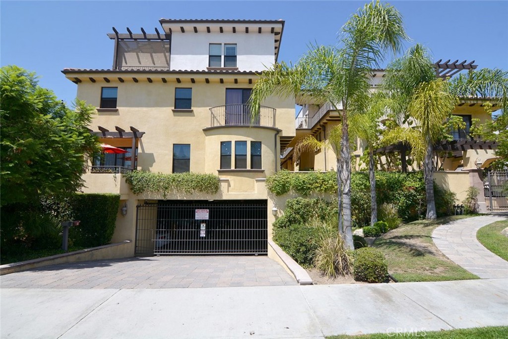 Now for Lease! Rare 3-bedroom, 3-bathroom front unit townhome in Glendale is now ready for you! Located in a beautiful complex with controlled access, a tranquil courtyard and 3 assigned parking spaces that comes with this unit! Inside features a fabulous floor-plan with sleek flooring, high-ceilings, crown/baseboard molding and recessed lighting. Gorgeous travertine flooring run throughout the first floor. The living room offers a cozy fireplace and a private balcony where you can add outdoor seating! There is a spacious kitchen that has stainless steel appliances and granite countertops. On the second floor you have Two master suites, both with en suite bath, hardwood flooring and a walk-in closet! This complex is minutes away from the Americana at Brand, Glendale Galleria, as well as Brand Boulevard where you have popular restaurants and shopping stores!