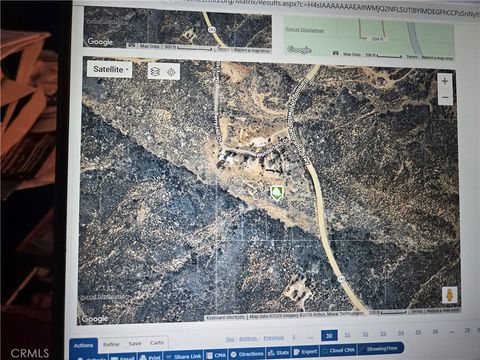 Photo of 47115 WONDERLAND Drive, Banning, CA 92220 (MLS # IV26078268)