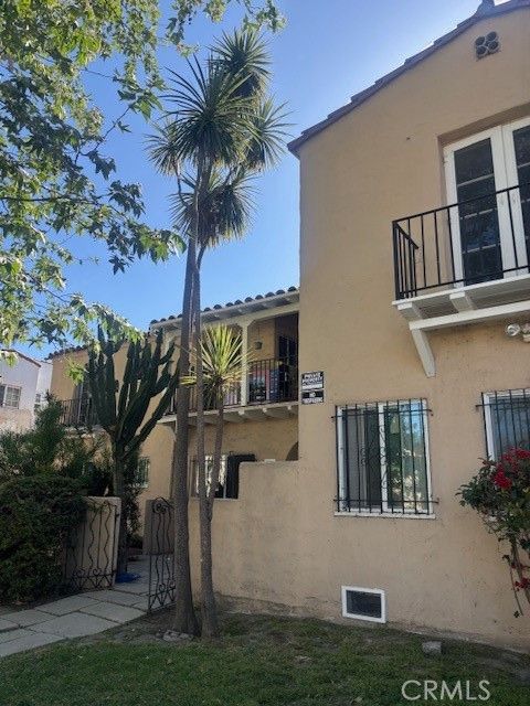 Photo of 4213 8th Ave, Los Angeles, CA 90008 (MLS # RS26091773)