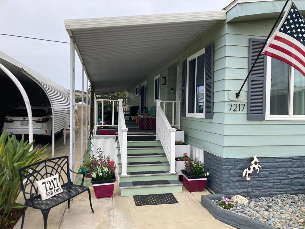 Welcome to this beautifully maintained exclusive gated community. Located in the prestigious 55+ 45 senior mobile home community of Lakeshore Gardens. Exceptional amenities, including a beautiful pool, hot sauna, fully equipped gym and welcoming clubhouse. Actives galore, community gatherings, always a card game or classes. Also enjoy ping pong, billiards, bocce ball and shuffleboard or walk the lake viewing the ducks and turtles. Convenience is key with this home, as it's located directly across the street from a bustling shopping complex, with grocery store to specialty food stores and fantastic dining options. enjoying the beauty of the ocean just a short walk or bike ride away, minutes drive from charming downtown Carlsbad village. Don't miss the chance to make this coastal gem yours! This 2020 remodeled mobile home is just 1500 feet from the Pacific Ocean. It features drywalled with crown molding, luxury vinyl plank flooring, new carpet, paint inside & out, new central heating system, new kitchen with all new white Shaker cabinets, new appliances, LG Wi-Fi washtower, LUXE bidet. 4 new fans, 4 Solatubes skylights, dual pane windows throughout, 2022 new composition roof, new front stairs, secret garden with the ocean breeze and a retractable rear deck awning. $2,525- RENT.