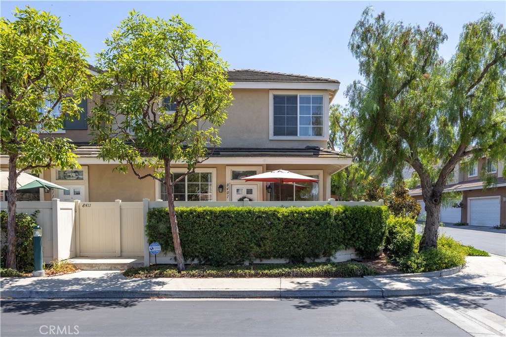 This beautifully upgraded 3-bedroom, 2.5-bathroom townhome with an attached 2-car garage is filled with natural light from its desirable end-unit location. Inside, you’ll find newer flooring, custom paint, central AC, and convenient in-unit laundry. The inviting living room features a cozy fireplace, while the modern kitchen offers upgraded finishes and a breakfast bar. The home also features a beautifully upgraded front yard with a resort-like feel, ideal for both everyday enjoyment and hosting guests. Upstairs, the spacious primary suite includes a private retreat, walk-in closet, and an en-suite bathroom. Two additional bedrooms share a generous Jack and Jill bathroom, making the layout perfect for families or guests. Enjoy resort-style HOA amenities including a pool, spa, clubhouse, and fitness room. Summit Park is located near award-winning Running Springs Elementary as well as excellent shopping, dining, and entertainment in Anaheim Hills.