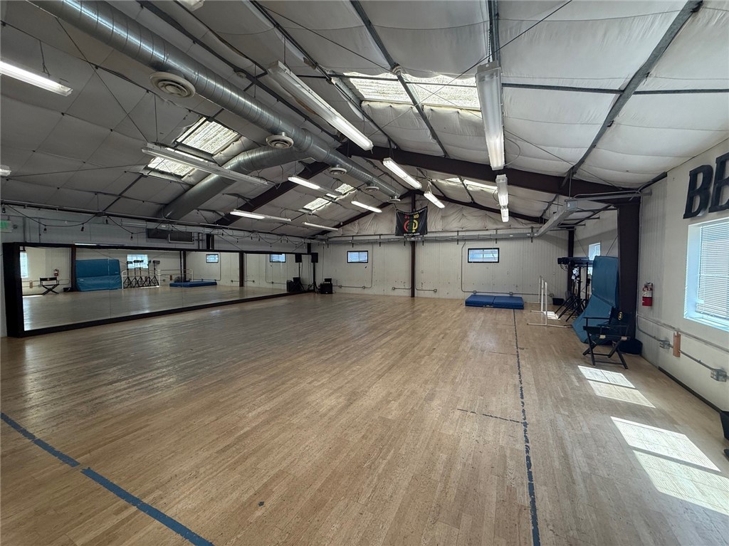 A fully insulated and air-conditioned warehouse/office with significant power and a small yard.