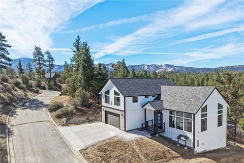 Photo of 445 Woodcreek, Big Bear City, CA 92314 (MLS # JT26026305)
