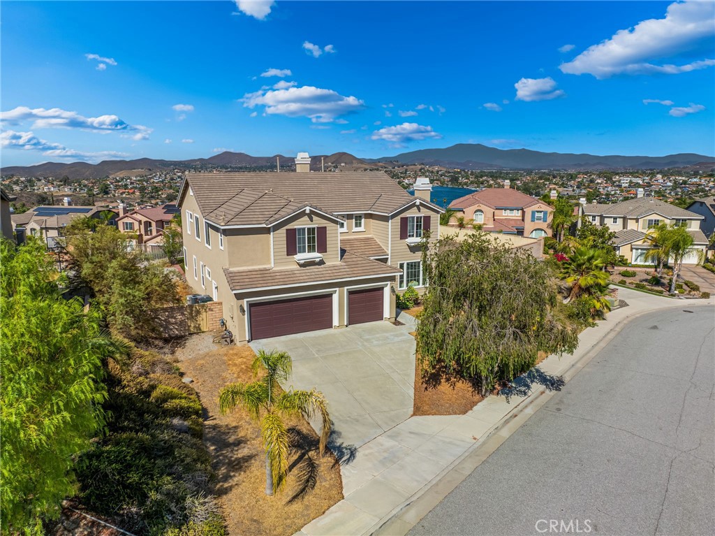 This house is located on a huge backyard lot over 14,000 sq ft. Gorgeous Canyon Lake view. It is in the highly desirable community of Tuscany Hills. Possible can build an ADU. Please check with city for detail. High ceilings. Huge downstairs bedroom suite. Open floor plan with kitchen and family room. Fireplaces in living room and family room. With downstairs powder room. Separate dining room. Big widely stairs. Kitchen island with granite countertop, stainless steel appliances. The master bedroom with private big balcony, jacuzzi bathtub with breathtaking view of Canyon Lake. Large walk-in closet. Second floor with two big bonus room. Jack and Jill bedrooms. Three bedroom suites. Large 3 cars garage. New painting inside and outside of whole house. The Tuscany Hills with huge community swimming pool and panoramic Canyon Lake view. 3 tennis courts, kids playground and more. You have year-round access to the resort-like amenities provided in the Tuscany Hills Community. Excellent location with easy access to freeways, shopping, restaurants, and entertainment.