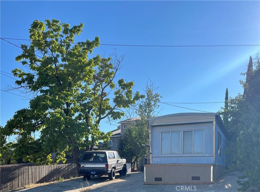Affordable 2BD/1BA mobile home in Clearlake on an upslope lot with views of the surrounding hills. Home features paved off-street parking, fully fenced yard, and a convenient location close to the hospital, shopping, and other local amenities. Currently rented at $1,200/month, making it a great option for investors or buyers looking for income potential. No 433A. Seller financing available.