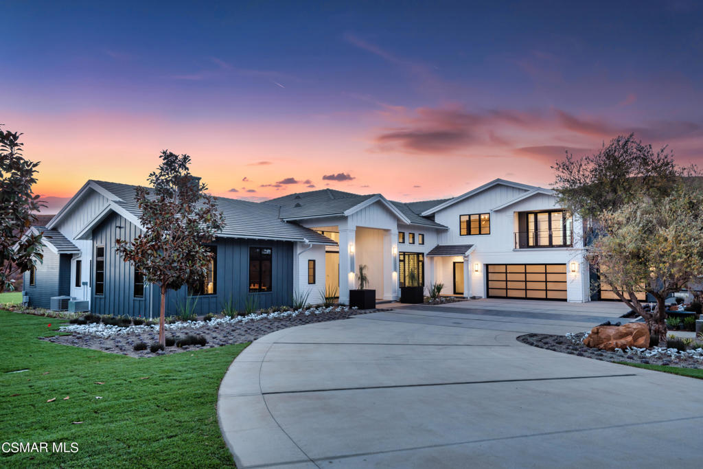 EPIC brand new contemporary farmhouse with a premier location in upper North Ranch! Privately gated trophy estate on over two acres with mountain views and complete privacy! No expense was spared to create this true masterpiece! Livable as mostly one level, this amazing open concept floor plan spans over 7000 square feet. Features include a grand 'great room' with 10 foot multi-slide Fleetwood glass doors, theater/bonus room, two sided glass wine cellar, office, soaring custom ceilings and much more. Up the floating stairs you will find an additional family room, 2 secondary bedrooms, one of which serves as a second primary suite option. The home is elevator ready if the buyer so desires. The main level primary suite is extraordinary. There are two large walk in closets, floor to ceiling stone fireplace and a gorgeous bathroom with steam shower and soaker tub. The resort quality grounds are second to none. There is a 90 foot infinity pool enhanced by fire & water features. There is also 1300 square feet of covered outdoor living, barbecue center and massive manicured lawns. Other amenities include a smart home system, FIVE car garage, Sonos sound, security cameras, large glass pivot front door and so much more. A very exciting estate to hit North Ranch.