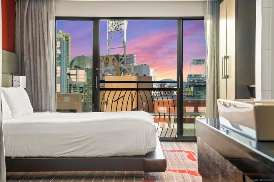 Invest like a rockstar! Located in the heart of the Gaslamp Quarter,  the Hard Rock Hotel offers unmatched access to Downtown’s most iconic attractions. Residence 940 is a 1 BR suite featuring a king bed, separate living area, and is exterior facing with views of Petco Park, the mountains, and city skyline. As part of the exclusive Rock Royalty program, this fully furnished unit grants owners access to premium hotel amenities and concierge-level services, including a private owner’s lounge with an open bar. Owners may place their unit in the hotel’s rental management program, allowing flexible personal use up to 28 days a year for free with an option to stay longer at a discounted rate, while also offering a hands off opportunity to generate potential revenue! Situated directly across from the convention center, the Gaslamp Quarter Trolley Station, and surrounded by premier restaurants, nightlife, and the gates of Petco Park, the Hard Rock Hotel's location is highly sought after for both leisure and business travelers.