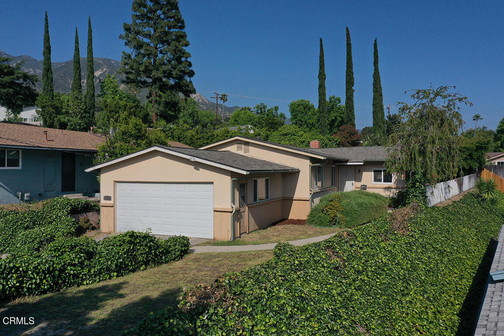 Nestled in the peaceful hills of the Crescenta Valley, 5020 Carolyn Way offers serene living with scenic views and a warm, welcoming atmosphere. This charming 4-bedroom, 2-bathroom home features newly installed flooring and fresh interior paint, blending comfort with modern updates. The home boasts a great floorplan with a natural flow between living, dining, and outdoor spaces--perfect for everyday living and entertaining. Enjoy picturesque vistas from the living areas and backyard, making it the perfect retreat after a long day. Located on a quiet street in a sought-after neighborhood, this home combines tranquility with convenience--ideal for those seeking a calm lifestyle just minutes from everything La Crescenta has to offer.