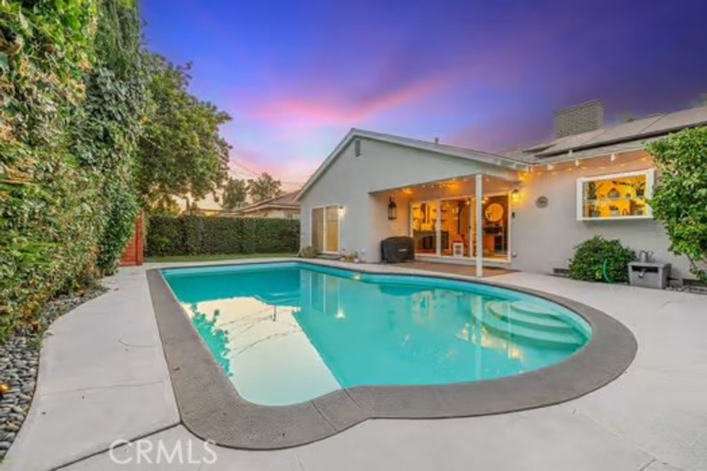 Photo of 14614 Runnymede Street, Van Nuys, CA 91405 (MLS # SR25198741)