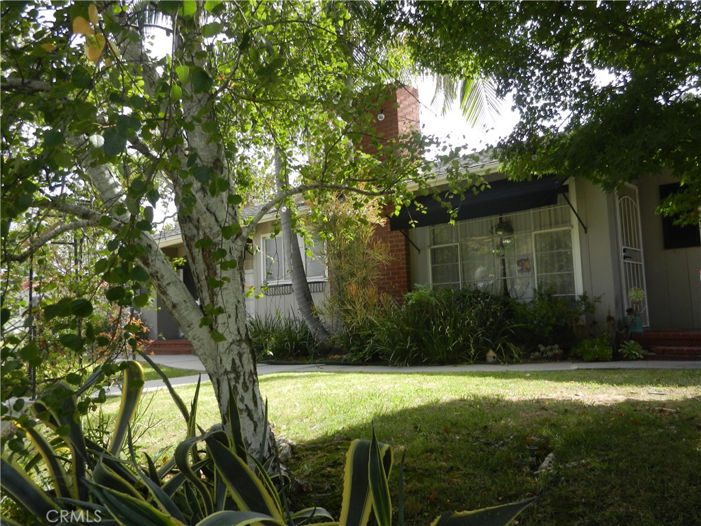 located in the heart of Historic California Heights, this is a classic mid century property in great condition and hard to find! 3698 is a corner unit with a 2 car garage with a door opener. There are also 2 bedrooms and a den with a wood burning fireplace and paneling. Hardwood floors throughout as well as tiled floors in the kitchen and baths. There is aslo a shared exterior laundry used by both units. This unit is about 1400 square feet. 3696 is a smaller 2 bedroom 1 bath unit with a wood burning fireplace and slate fireplace trim.This unit has a one car garage with a door opener and is about 1000sq.ft.
This property is located on a knoll and has a full auto sprinkler system The back has a full brick patio and great privacy. The laundry is shared by both units currently. Please respect the tenants privacy. The
The 2 bedroom and den could be a 3 bedroom unit with a closet and wood burning fireplace.
