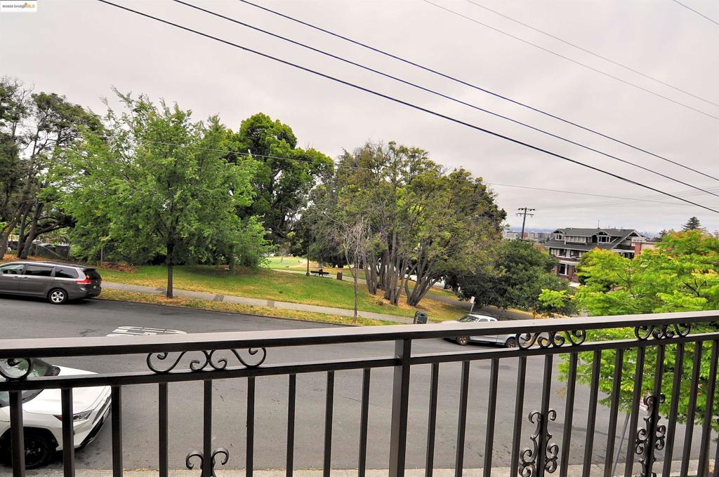 The townhouse has been renovated with luxury-vinyl floors throughout and with quartz countertops in the kitchen, double pane windows, window blinds and new paints in and out. This is a single family home with no HOA. Attached one car garage and plenty parking spaces on street. All four townhouses in this row have excellent views, but this one has the best. Look out over the 11 acres of San Antonio Park with its tennis courts, soccer field, basketball court, playground and picnic area. From two balconies and a deck take in city views of Oakland, the Bay Bridge and San Francisco's famous skyline. Easy access to HWY 880 and 580. You will enjoy strolling through this quiet and open neighborhood to nearby Lake Merritt with its many restaurants and dynamic social scene. Welcome home to this move-in-ready unit. Adjacent dwelling unit sold for over $800k in prior years. Views: Downtown