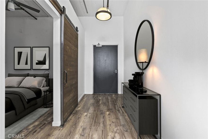 This updated 1 bed, 1 bath corner residence offers approx. 800 sq ft of comfortable living in downtown Los Angeles. Unit 222 features an upgraded kitchen and bathroom, a spacious bedroom, in unit laundry and the bonus of extra privacy with fewer shared walls than other units. The building offers secured, gated access with 24-hour guard and surveillance for peace of mind. Residents enjoy a resort-style pool and spa, a fitness center, a BBQ and lounge area, plus a dog run for pet owners. One covered parking space in a secure multi-level garage. The building sits in a prime DTLA location, close to Little Tokyo, the Arts District, restaurants, coffee shops, transit, and everything the city has to offer. A clean, move-in-ready space with great potential to make your own, just in time for the holidays and ahead of the upcoming LA Olympics.