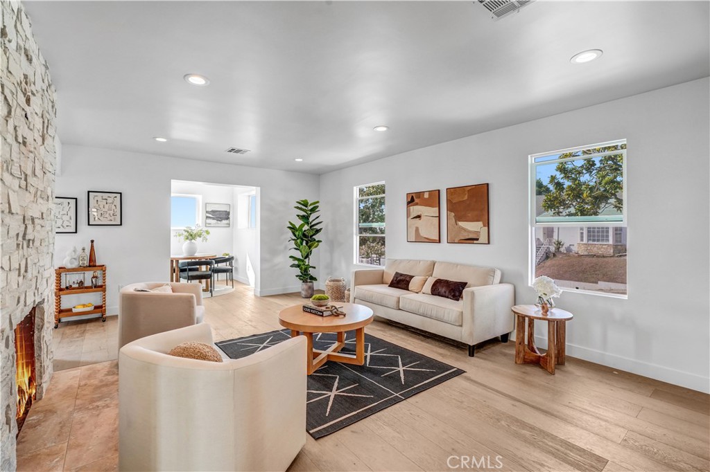 Receive a 20k grant with a City National Bank ladder up program. Welcome to 5452 Harcross Dr, a beautifully reimagined 3-bedroom with a large family room ( can be used as a bedroom) along with 3 restrooms, This home is tucked away in the highly desirable Windsor Hills neighborhood. Thoughtfully designed for modern living, this residence offers flexibility, style, and comfort at every turn. Beautiful classic Windsor Hills Curb appeal really makes you appreciate this home.
The main level features a bright and open floor plan with 3 spacious bedrooms and 2 bathrooms, Including a Primary bedroom and restroom, The open layout seamlessly connects the living room with a fireplace, dining, and kitchen areas—perfect for gatherings or quiet evenings at home. Step out onto the balcony off the kitchen and enjoy sweeping views, a serene backdrop for morning coffee or sunset dinners.
Downstairs, you’ll find a large family room with its own fireplace that can be used as a bedroom if needed, It also has a Nice restroom and large laundry room with its own exterior and garage access for a possible downstairs ADU for extended family or guest.
The expansive yard is a true standout, with mature trees providing privacy and the possibility to create your own outdoor oasis—whether it’s a pickleball court, basketball court, or lush garden retreat.
Located near hiking trails, shops, freeways, and all that Windsor Hills has to offer, this home perfectly blends convenience with tranquility. Move-in ready and designed for today’s lifestyle, 5452 Harcross Dr is ready to welcome you home.