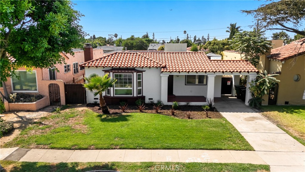 Welcome to this beautifully renovated Spanish-style home in Inglewood! Offered at $1,149,000, this move-in ready residence features ~1,860 sq ft of living space on a generous 7,059 sq ft lot. The home has been reimagined to a modern, open concept design. Recent high-end upgrades include fresh paint inside and out, all new copper plumbing, and a 200-amp electrical panel.
The heart of the home is the upgraded kitchen, boasting natural wood cabinets, quartz countertops, and new white Café appliances. Two completely remodeled bathrooms feature new tile, tubs, fixtures, glass enclosures and modern vanities. Vinyl-wood flooring flows throughout. Lighting has been fully updated — recessed lights and new fixtures everywhere, plus all new interior and glass closet doors.
The master suite is expansive, with a large walk-in closet, a huge master bathroom, and elegant French doors that open to the backyard. A first bath offers a tub plus separate glass-shower enclosure. Additional features include an automatic garage door, newly finished garage with drywall and epoxy floor, newer noise reduction insulated windows, and hallway storage cabinets.
Outdoors, the backyard is designed for low maintenance with artificial turf and fresh landscaping, while the front yard also offers beautifully renewed landscaping and lush grass. Bonus room attached to the garage adds versatile space, ideal for an office, studio, additional storage or potential ADU! The home is newly finished with dual-pane windows, drywall, and recessed lighting. It offers central AC & heat for year-round comfort.
Don’t miss this one-of-a-kind Spanish gem, combining modern luxury, thoughtful design, and prime location!