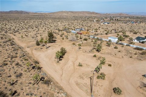 Photo of 3155 Thermal Lane, Yucca Valley, CA 92284 (MLS # IG25048181) Photo of 3155 Thermal Lane, Yucca Valley, CA 92284 (MLS # IG25048181)