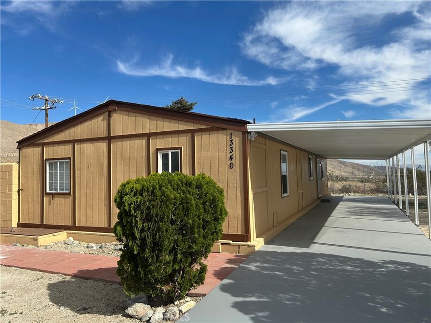 Welcome to 13340 Mesquite Rd in Whitewater! This charming 3-bedroom, 2-bath manufactured home is situated on a permanent foundation and offers comfortable living in a peaceful rural setting. The property sits on a spacious lot with a covered carport and an extended concrete driveway large enough to accommodate multiple vehicles or an RV.



Enjoy stunning 360-degree mountain views from every angle, creating a serene backdrop for your morning coffee or evening sunsets. Inside, the home features an open and inviting floor plan with abundant natural light, a well-appointed kitchen with ample counter space and cabinetry, and a spacious living area ideal for relaxing or entertaining.



Conveniently located just minutes from Morongo Casino, Cabazon Outlets, and Palm Springs, this home offers a perfect blend of tranquility and accessibility. Easy access to the 10 Freeway makes commuting a breeze.



Don’t miss this opportunity to own a well-maintained home with endless potential in the beautiful community of Whitewater.