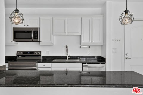 Photo of 3740 Santa Rosalia Drive #326, Los Angeles, CA 90008 (MLS # 26867753)