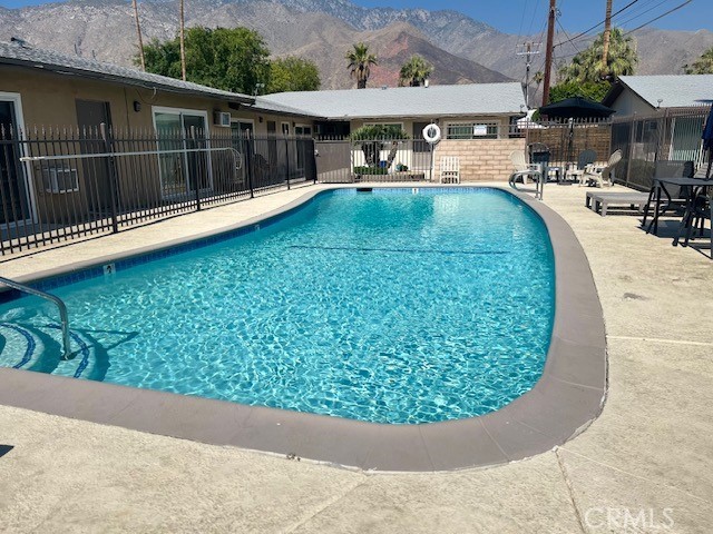 The property is located at Vista Chino and Indian Canyon. The property is also located only a few blocks from several schools, and a park and is within close proximity to downtown Palm Springs and all of its amenities.
The property has been renovated both interior and exterior. The renovations include all new exterior painting, exterior foam and stone treatment, all new landscaping, all new lighting, new pool decking, pool furniture, new BBQs in the courtyard, and all new laundry equipment for the laundry rooms.
This unit has updated flooring, new paint, new blinds, new energy-efficient heating, and air conditioning systems, all new appliances, new hardware, and finishes.