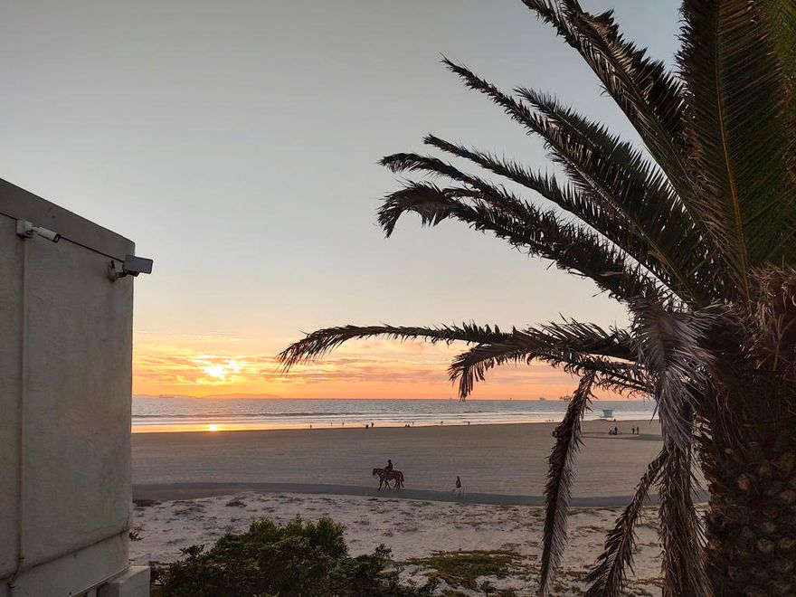 Imagine waking to the soothing sound of waves and the ocean breeze drifting through your window. As the morning sun casts a golden shimmer on the water, you're invited to step outside and the soft sand welcoming. This isn't just a dream vacation it's your new reality in Huntington Beach's most coveted beachfront community. This beautifully remodeled 2-bedroom, 2-bathroom ocean-view condo is located in the exclusive, guard-gated Huntington Pacific Community offering a rare opportunity to own on the sand. Perched on the second floor with stunning coastal views, this 1,048-square-foot retreat has been thoughtfully upgraded to blend modern elegance with relaxed beachside living. Inside, you'll find quartz countertops, Italian cabinetry, premium Samsung appliances, in unit washer and dryer, updated plumbing fixtures, LED lighting, and newer flooring, all creating a clean, contemporary look. The exterior has been fully renovated with new stucco and a newer roof. Step onto the ocean-view patio, where the sound of the surf becomes your soundtrack perfect for slow mornings, sunset gatherings, or peaceful evenings under the stars. Beyond your front door, enjoy resort-style amenities including a heated swimming pool, sauna, clubhouse, BBQ grills, picnic tables, oceanfront fire pits, and laundry facilities. With gated and security, one assigned underground parking space, an additional outdoor space, guest parking, and a private storage locker, every convenience is covered. And the location? Unbeatable. Just moments from the iconic Huntington Beach Pier, Pacific City, world-class restaurants, boutique shopping, and the year-round events that define Surf City USA. Whether you're enjoying a seaside dinner, biking along the boardwalk, or cruising down Pacific Coast Highway, the best of coastal living is always within reach.This isn't just a home it's an escape, a sanctuary, and a front-row seat to the beauty of the Pacific Ocean. Whether you're seeking a full-time residence, a weekend retreat, or a prime investment in beachfront real estate, this is your chance to own something truly special. The beach is calling. Are you ready to answer?