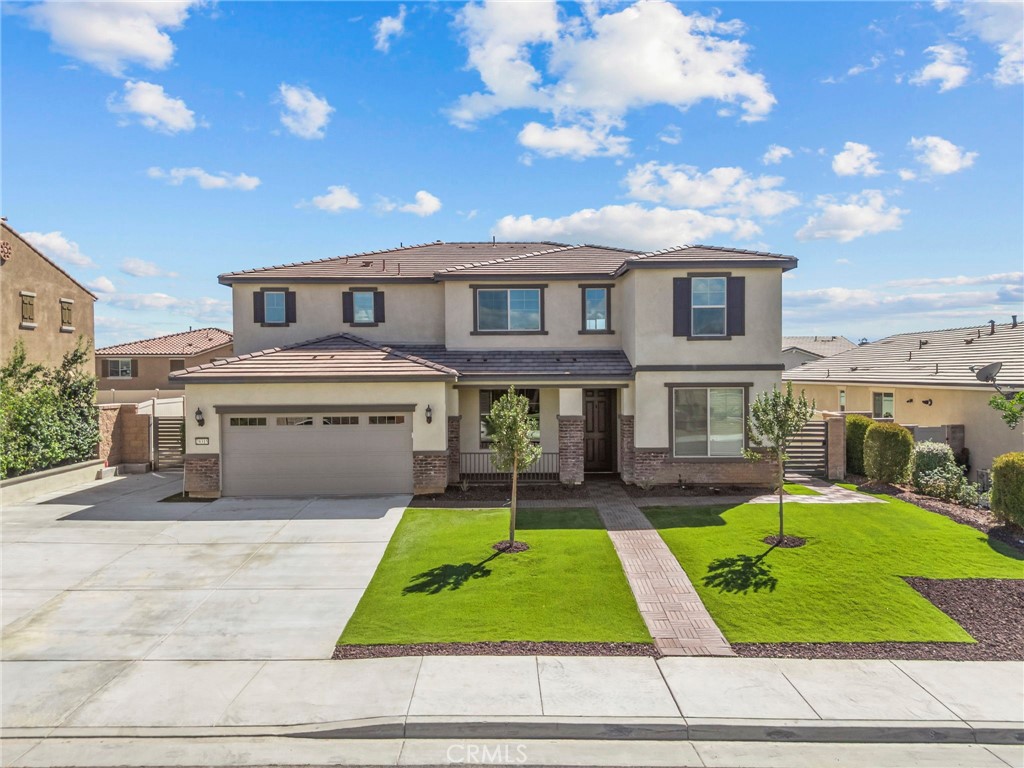 POOL | SPA | IN-LAW SUITE DOWNSTAIRS | 2 MAIN FLOOR BEDROOMS | 2 MAIN FLOOR FULL-BATHROOMS | SOLAR | LOW HOA | UPGRADED KITCHEN | UPGRADED FLOORING | LOFT | TANKLESS WATER HEATER | RV PARKING | You have Arrived! Welcome to this stunning home in the desirable Windsor-Brixton Community of Menifee, offering the perfect blend of spacious living and resort-style amenities.
As you enter, the formal dining room sits gracefully to the left, while the right wing of the entry showcases a main-floor bedroom and full bath—ideal for guests or multi-generational living. Beyond, the open-concept family room seamlessly connects to the chef’s kitchen featuring a large island, abundant cabinetry, an upgraded full backsplash, and a generous walk-in pantry. Just past the kitchen, another bedroom and full bath provide additional convenience.
Upstairs, you’ll find a massive loft, four more bedrooms, and three full bathrooms. Two secondary bedrooms share a jack-and-jill bath, while the luxurious primary suite boasts peek-a-boo mountain views and a spa-inspired ensuite with an enormous walk-in shower. Throughout the home, upgrades abound including vinyl plank flooring, custom lighting and ceiling fans, modern door and bath hardware, and ample storage.
Step outside to your private oasis designed for entertaining and relaxation. Enjoy a custom pool and spa with dual fire pit water fountains, Pentair salt system, and custom pool-grade turf decking. The low-maintenance landscaping includes Newtechwood Spanish Walnut decking, natural grade turf throughout, Bay leaf trees, and window planter boxes. Additional highlights include a built-in covered patio with recessed lighting, custom side yard gates, an extended RV-access driveway, and beautifully designed front and rear retaining walls with red lava rock accents.
The finished garage offers epoxy flooring, a service door, and upgraded garage door windows.
This remarkable home truly has it all—style, comfort, and outdoor luxury.