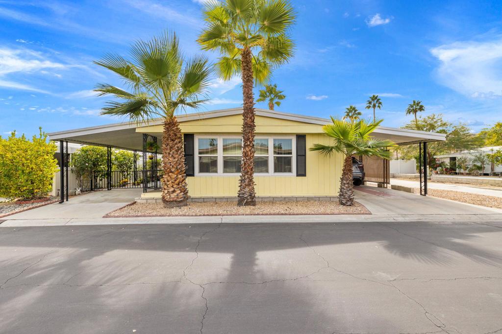 You Own the Land, El Dorado Palm Springs, near Traders Joes, airport and all the shopping. Home is located quiet street where 2nd pool and tennis court are. 20K in renovations include all new interior paint,new lighting fixtures and plumbing fixtures, new countertops and sinks in bathrooms and bar, LVP flooring throughout, and roof seal protection has been applied. Features include attractive curb appeal and formal entry, a great garden patio oasis with pet friendly fencing.
