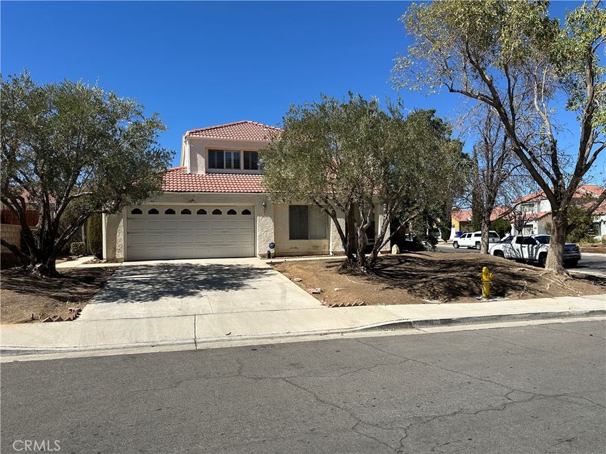 Tucked away in a peaceful, established neighborhood, this property offers great potential to build equity. Though its needs of some cosmetic updates, its spacious layout and private backyard provide a rewarding opportunity for the right owner. Conveniently located near schools, parks, shopping centers, Palmdale Regional Medical Center, and medical offices, this home is also commuter-friendly with easy freeway access.

Step inside to a spacious living room with cathedral ceilings and a cozy fireplace, creating a warm and inviting atmosphere. Beautiful wooden shutters adorn every window, providing both elegance and privacy throughout. A bonus room downstairs offers flexibility—perfect for a fourth bedroom, home office, media room, or playroom.

The kitchen and family room area features a comfortable breakfast nook, granite countertops, stainless steel appliances, and plenty of cabinet space. Sliding glass doors lead to a large backyard with a covered patio area, ideal for family gatherings. The BBQ gazebo is ready for your new grill, complete with a gas line connection, and the enclosed jacuzzi provides the perfect spot for evening relaxation.

Additional highlights include a newer A/C and heating unit as well as a newer water heater. Don’t miss this fantastic opportunity—stop by and see it for yourself!