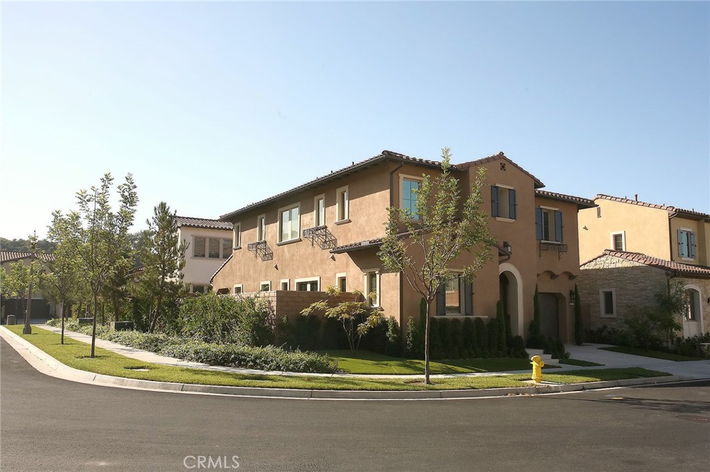 No pet, No smoking, No outside shoes in the house only. Absolute luxury home at the 24 hour guard-gated s Groves at Orchard Hills. This corner lot property has good privacy, and extra side yard around 300sqf bigger than regular size yard. Side yard gets shadow from around noon, it makes perfect playground area for the family. The great floor plan 3 by Taylor Morrison. This stunning 2-story architectural beauty features 4 Bedrooms, 4.5 bath, and 2 car attached garage. Luxury Engineer real wood floor throughout the entire home. Beautiful porch entry that opens to a soaring ceiling. Abundant windows cast lots of natural light across the open floor plan on 1st floor. This plan features one bedroom with its own living room & bath on the first floor for the guest or owner’s home office. The open living room is situated off the kitchen that looks out to the backyard. The gourmet kitchen comes with beautiful White tone Quartz countertops, a big island with an water fall extended bar seating area great for breakfast, new stainless steel Monogram appliances, and plenty of clean cabinet space. The extra refrigerator and storage are in the pantry already. The open dining room awaits for your happy dinner with your family members. There is a spacious family room with ceiling LED recessed lights that’s perfect for family private time on 2nd floor. Adjacent large master suite with its own private luxury bath features dual sinks, walk-in rain shower, tub, and a spacious walk-in closet. Two secondary bedrooms with their own full bathrooms complete the upstairs level. All bathrooms are upgraded with custom tiles. All bedrooms are equipped with LED lighting fixture on the ceiling. The corner unit provides extra size side yard, and the backyard is great for entertaining and relaxing under the covered California room avoid California hot weather. Surround yourself in nature among the beautiful hills and avocado orchards. Within a few minutes to award-winning schools. This perfect home is waiting for your family now!