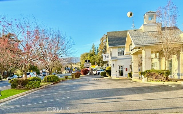 OPPORTUNITY AWAITS. Positioned at the bustling intersection of Eleventh Street and State Highway 140, this Professional Building stands as a beacon of quality construction spanning 5,442 square feet. Located in the esteemed Gold Country in the delightful historic town of Mariposa. This property enjoys a central spot in a highly sought-after recreational area and residential community. Offering exceptional visibility with 170 feet of frontage along Highway 140, the building benefits from the steady flow of traffic traveling through Mariposa each year, most on their way to visit YOSEMITE, making it a very desirable location. Parking is a breeze with 24 spaces available on-site, supplemented by additional parking options on Charles Street and Highway 140. The building features reinforced concrete on the lower level and custom stucco cladding over durable sheeting and a wood frame interior. Each suite is outfitted with its own heating and cooling units for personalized comfort. A Commercial Condominium Map has been officially approved and recorded, dividing the property into three distinct units while offering shared amenities like a kitchen, restrooms, and site enhancements. NEW GROCERY STORE? PHARMACY? RESTAURANT? BREWERY? LAW OFFICES? DENTAL OFFICE? URGENT CARE? LODGING?
