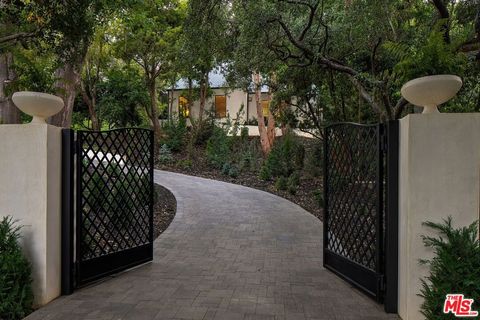 Photo of 943 Moraga Drive, Los Angeles, CA 90049 (MLS # 26671463)