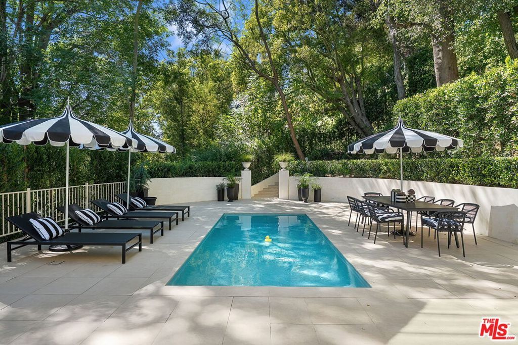 Photo of 943 Moraga Drive, Los Angeles, CA 90049 (MLS # 26671463)