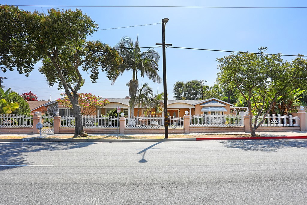 Looking for a perfect house! You Found It! Welcome to this Gorgeous 4 bedroom 3 1/2 bath home in West Covina. This home comes with a walk-in closet in the master bedroom, a nice cozy fireplace in the dining room, a large living-room with new flooring. Also comes with an extra room, leading out to the huge backyard full of tropical fruit trees. The large backyard features a patio area and concrete walk-way through out the yard. Easily for an ADU or Maybe triplex. This home is nicely gated and walled throughout the property for that private living. Also the home is conveniently located near the 10 fwy and to West Covina High School.