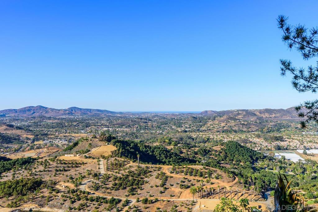 Rincon Hills is an extraordinary private gated estate with panoramic views from Pacific Ocean to Dixon Lake, in N. San Diego County. Multiple homes, 24 separate APN's totaling 290+ acres. The property has yurt, swimming pool, RV parking and multiple-car garage. Plenty of space to build or have a private retreat. Property has self-contained greenhouses, income producing citrus, avocado and exotic trees w/ massive infrastructure and equipment. Multiple source of water: municipal and private working wells.