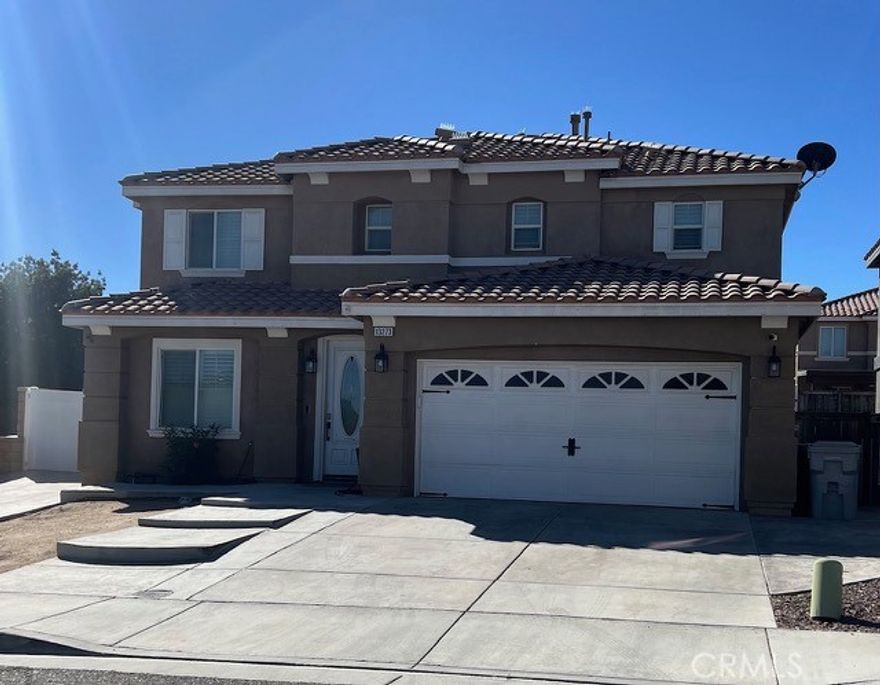Beautiful 2 story home in most desired Hesperia neighborhoods.  Spacious living room, dining area, huge upgraded Kitchen, 4 good size bedrooms a 3 bathrooms. Very open floor plan with family room next to kitchen.  Loft at the top of the stairs and a huge master bedroom. Home is a corner lot and has access to the back yard for all your weekend toys.  Back yard has a covered patio and well kept back yard.