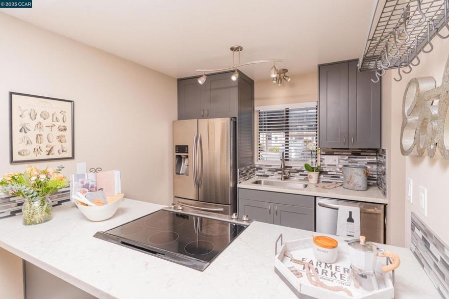 Welcome to this charming condo at 1821 Paseo Laguna Seco! Beautifully remodeled, it features dual-pane windows for ample natural light. The entry reveals a convenient half bath and a remodeled kitchen with stainless steel appliances and granite countertops, open to the dining area. The cozy living area includes a fireplace and rear patio access, perfect for relaxation. Upstairs, you'll find two Primary bedrooms, each with its own private bathroom, and ample closet (two and a half baths total !!). An in-unit washer and dryer are located in the hallway between the bedrooms. The home has central AC and heating. Two assigned parking spaces, one covered, are directly outside the front door. Residents enjoy an inviting communal pool and proximity to Livermore Downs Park, which has added pickleball courts to the existing playground, basketball court, and spacious sports field. Conveniently located near downtown Livermore shopping and dining, wineries, Las Positas College, and LLNL, with easy access to the ACE train, freeway 580 east bound and west bound towards 680, highway 84 towards Sunol, and the Dublin BART station.