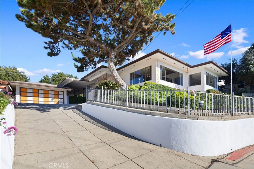 Tucked away in the Hills of Whittier with Million Dollar Views! This Mid-Century Modern retreat home is one of a kind with thoughtful architecture frames a floor-to-ceiling stone fireplace in the living room with amazing vista. The traditional kitchen carries a true mid-century vibe with custom cabinetry, a custom island, and built-in breakfast nook that flows to the dining area (all appliances included). The master bedroom captures stunning vista/views, while a versatile retreat/lounge opens via sliding doors to a deck overlooking the enclosed backyard with countryside retreat settings and multiple fruit trees, one of many places to drink a cup of coffee and enjoy the birds serenate. Additional highlights include central air/heat, copper plumbing, owned solar system, recessed lighting, newer waterproof laminate flooring throughout, and a spacious laundry room. Large workshop attached to the garage that could be converted into a Jr ADU! (Buyer to check with the city and do their own investigation). Separate storage room for the season holidays. An extended breezeway/Carport that leads to a large-covered patio and a private entertaining area featuring a tiki bar/cantina and hot tub set among lush bird-of-paradise. The home site offers dual access to both Streets S Circle Dr and N Circle Dr a rare convenience in the hills with potential to build an ADU facing N Circle Dr. From sunrise coffee to twilight dining, the front and rear outdoor yards provide several retreat sitting areas that offer a lifetime of serenity. Buyers’ incentives are available! Long driveway and parking for 6 cars. A rare Whittier hillside opportunity, style, setting, and views in one compelling package. Clearly one of the rare opportunities of Having it all, it doesn’t get any better! Inquire today!